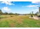 Spacious backyard with patio and lake view at 5720 107Th E Ter, Parrish, FL 34219