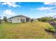 Large backyard with a view of neighboring homes at 5720 107Th E Ter, Parrish, FL 34219