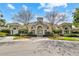 Elegant community clubhouse with stone accents and landscaping at 5720 107Th E Ter, Parrish, FL 34219