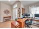 Light and airy entryway with a desk and chair, offering a functional workspace at 5720 107Th E Ter, Parrish, FL 34219