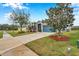 House exterior, driveway, and walkway with landscaping at 5720 107Th E Ter, Parrish, FL 34219