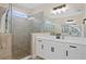 Spa-like bathroom with a large walk-in shower and double vanity at 6205 Voyagers Pl, Apollo Beach, FL 33572