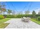 Outdoor patio with string lights and seating area at 6205 Voyagers Pl, Apollo Beach, FL 33572