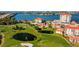 Aerial view of waterfront community with golf course, pool, and condos at 6265 Sun Blvd # 906, St Petersburg, FL 33715