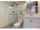 Clean bathroom with walk-in shower and updated vanity at 6265 Sun Blvd # 906, St Petersburg, FL 33715