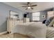 Main bedroom with ample storage and a ceiling fan at 6265 Sun Blvd # 906, St Petersburg, FL 33715