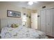 Bedroom with double door closet and coastal decor at 6432 Remus Dr, New Port Richey, FL 34653