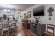 Cozy dining area with a table and chairs, adjacent to the kitchen at 6432 Remus Dr, New Port Richey, FL 34653