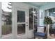 Relaxing sunroom with seating and access to backyard at 6432 Remus Dr, New Port Richey, FL 34653