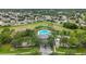 Aerial view of community pool and surrounding homes at 656 Argyll Dr, Spring Hill, FL 34609