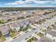 Aerial view of a residential neighborhood with houses and streets at 656 Argyll Dr, Spring Hill, FL 34609