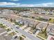 Aerial view of a residential neighborhood with houses and streets at 656 Argyll Dr, Spring Hill, FL 34609