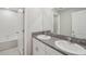 Bathroom boasts double sinks, granite countertop and a bathtub at 656 Argyll Dr, Spring Hill, FL 34609