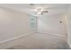 Spacious bedroom with neutral walls and plush carpeting at 656 Argyll Dr, Spring Hill, FL 34609