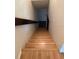 Stairs to the basement are wood and freshly refinished at 7806 Amberlea Ct, Temple Terrace, FL 33637