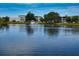 Serene lake view with fountain and lush trees at 8101 113Th Street St # 107, Seminole, FL 33772