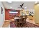 Bright dining area with wooden table and a colorful rug at 830 23Rd N Ave, St Petersburg, FL 33704