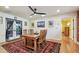 Dining room with wooden table and access to backyard at 830 23Rd N Ave, St Petersburg, FL 33704