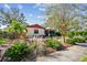 Updated bungalow with attractive landscaping and walkway at 830 23Rd N Ave, St Petersburg, FL 33704