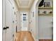 Hallway with hardwood floors and neutral colored walls at 830 23Rd N Ave, St Petersburg, FL 33704