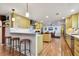 Modern kitchen with yellow cabinets and stainless steel appliances at 830 23Rd N Ave, St Petersburg, FL 33704