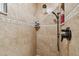 Large walk-in shower with tiled walls and a built-in seat at 830 23Rd N Ave, St Petersburg, FL 33704