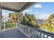 Relaxing balcony with pool and tropical views at 108 13Th Ave, Indian Rocks Beach, FL 33785