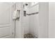 Walk-in shower with subway tile and pebble floor at 108 13Th Ave, Indian Rocks Beach, FL 33785