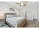 King bedroom with ample closet space and coastal decor at 108 13Th Ave, Indian Rocks Beach, FL 33785