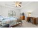 Main bedroom with a double bed and dresser at 10833 Collar Dr, San Antonio, FL 33576
