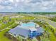 Aerial view of Bella Lago community pool, clubhouse, and playground at 12143 Kingsley Trl, Parrish, FL 34219