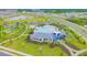 Community pool, clubhouse, playground, and pond in Bella Lago at 12143 Kingsley Trl, Parrish, FL 34219