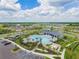Resort-style pool, clubhouse, and playground in Bella Lago at 12143 Kingsley Trl, Parrish, FL 34219