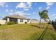 Large backyard with grassy area and privacy fence at 12143 Kingsley Trl, Parrish, FL 34219