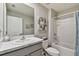 Well-maintained bathroom with a single sink and bathtub at 12143 Kingsley Trl, Parrish, FL 34219