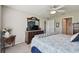 Bright bedroom featuring a comfortable bed and ample closet space at 12143 Kingsley Trl, Parrish, FL 34219