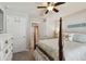 Bedroom with coastal decor and ceiling fan at 12143 Kingsley Trl, Parrish, FL 34219