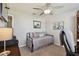 Comfortable bedroom with a daybed and ceiling fan at 12143 Kingsley Trl, Parrish, FL 34219