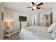 Bedroom with a TV, dresser, and nightstand at 12143 Kingsley Trl, Parrish, FL 34219
