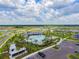 Resort-style community pool with plenty of lounge chairs at 12143 Kingsley Trl, Parrish, FL 34219