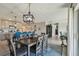 Open concept dining room with kitchen and Gathering room views at 12143 Kingsley Trl, Parrish, FL 34219