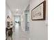 Bright entry hall with tile flooring and view to living area at 12143 Kingsley Trl, Parrish, FL 34219