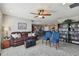 Gathering room with open concept to kitchen and built-in bookcase at 12143 Kingsley Trl, Parrish, FL 34219