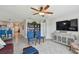 Open concept Gathering room with views to kitchen and backyard at 12143 Kingsley Trl, Parrish, FL 34219