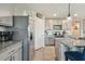 Modern kitchen features stainless steel appliances and granite countertops at 12143 Kingsley Trl, Parrish, FL 34219
