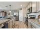 Modern kitchen with granite counters and stainless steel appliances at 12143 Kingsley Trl, Parrish, FL 34219