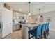 Modern kitchen with granite countertops and stainless steel appliances at 12143 Kingsley Trl, Parrish, FL 34219