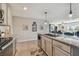 Modern kitchen with granite countertops and stainless steel appliances at 12143 Kingsley Trl, Parrish, FL 34219