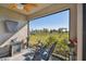 Relaxing screened porch with view of backyard at 12143 Kingsley Trl, Parrish, FL 34219