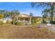 Charming single-story home with landscaped yard and walkway at 1270 Nicholson St, Clearwater, FL 33755